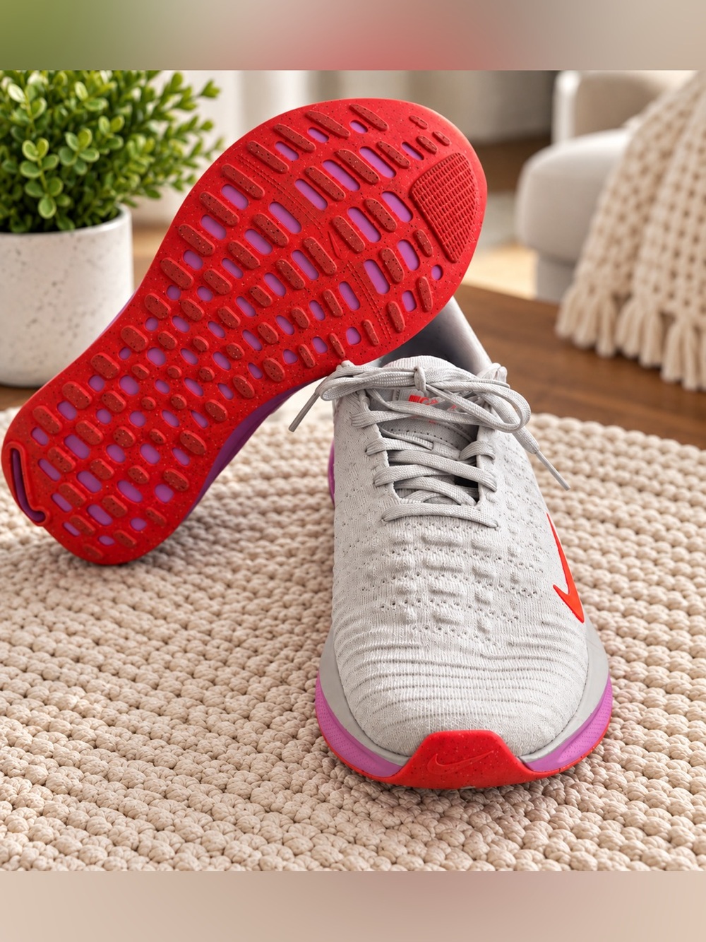 Nike Women's Light Gray Running Shoes with Pink and Red Accents